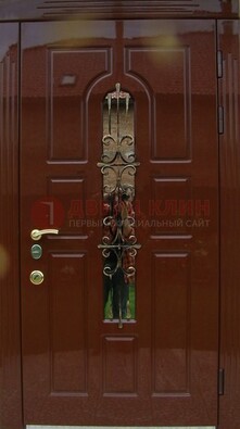 Красивая металлическая дверь со стеклом и ковкой ДСК-33 в Люберцах