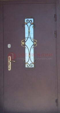 Металлическая дверь со стеклом и ковкой ДСК-77 в Люберцах